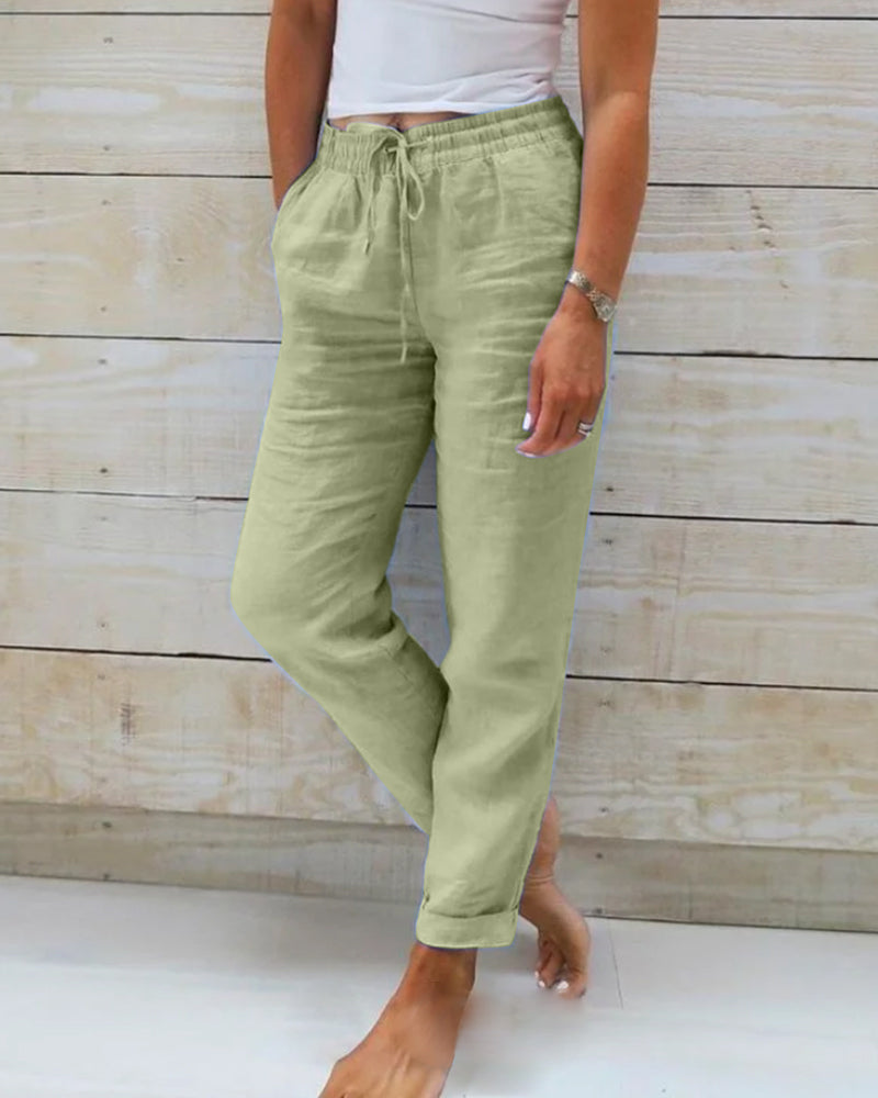 Pantalon décontracté droit en coton et lin respirant à taille élastique ; disponible en six couleurs.