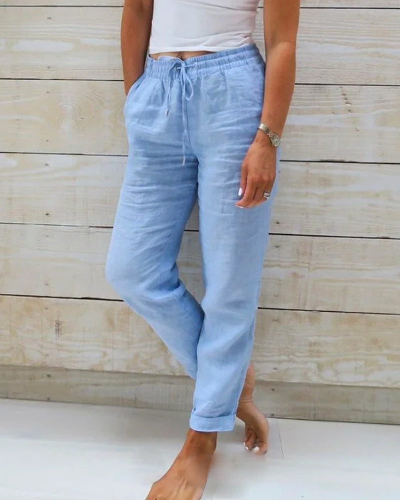 Pantalon décontracté droit en coton et lin respirant à taille élastique ; disponible en six couleurs.