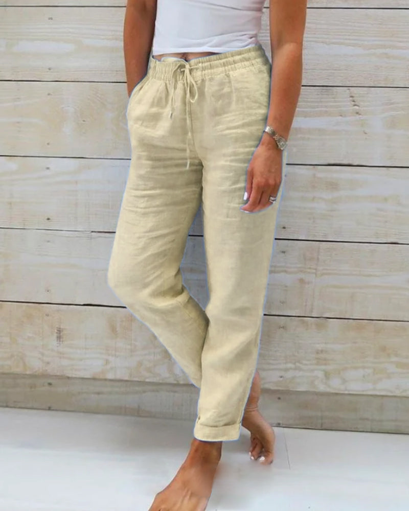 Pantalon décontracté droit en coton et lin respirant à taille élastique ; disponible en six couleurs.