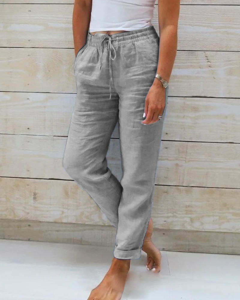 Pantalon décontracté droit en coton et lin respirant à taille élastique ; disponible en six couleurs.