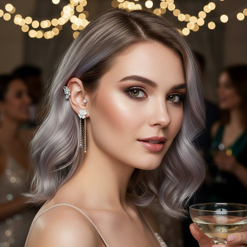 Butterfly-shaped earrings with zirconia and tassels