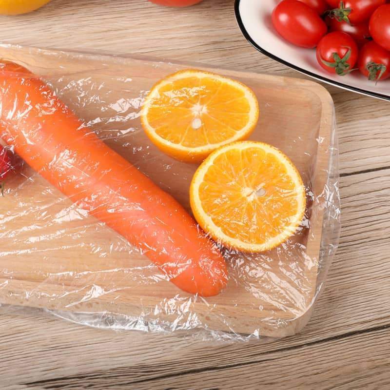 Lot of 100 disposable stretch films for bowls and plates, elastic lids for containers, alternative to cling film for storing leftovers, fruits, vegetables and food in the kitchen