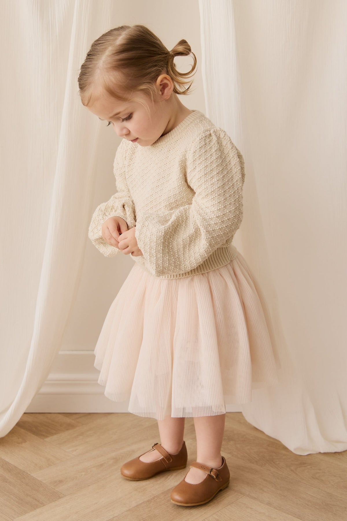 Jupe plissée fille en tulle et coton uni rose poudré avec taille élastiquée et superposition aérienne légère pour occasions habillées