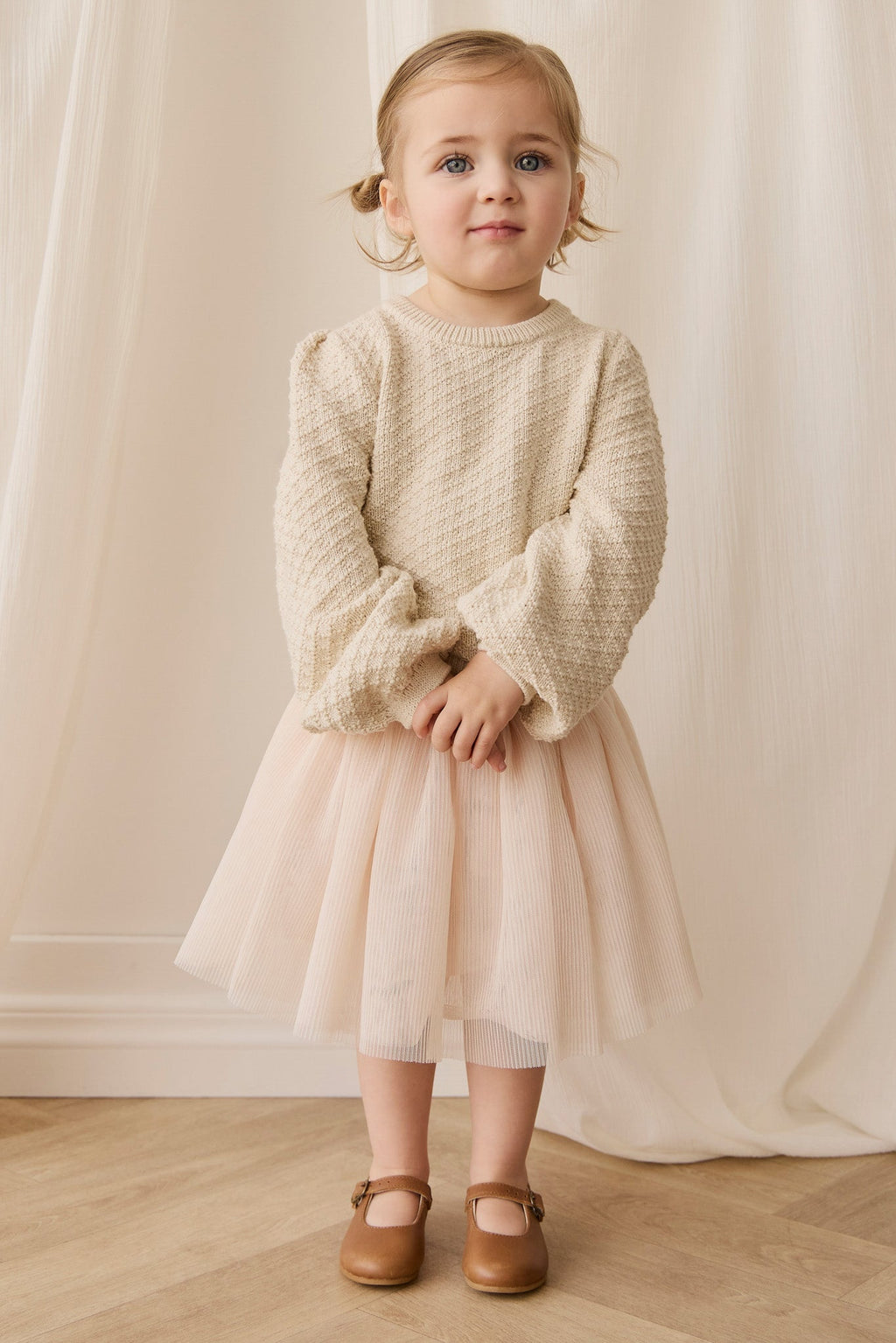 Jupe plissée fille en tulle et coton uni rose poudré avec taille élastiquée et superposition aérienne légère pour occasions habillées