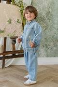 Pantalon en jean délavé bleu clair uni en coton pour enfant avec taille élastique et fermeture boutonnée sans nickel pour les sorties décontractées