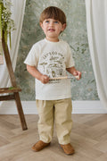 Pantalon classique neutre en coton texturé froissé avec élasthanne, passants de ceinture et taille élastiquée au dos pour le style quotidien des enfants