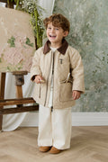 Pantalon droit classique pour enfant en coton et élasthanne crème uni, taille élastique et poches fonctionnelles pour un look décontracté