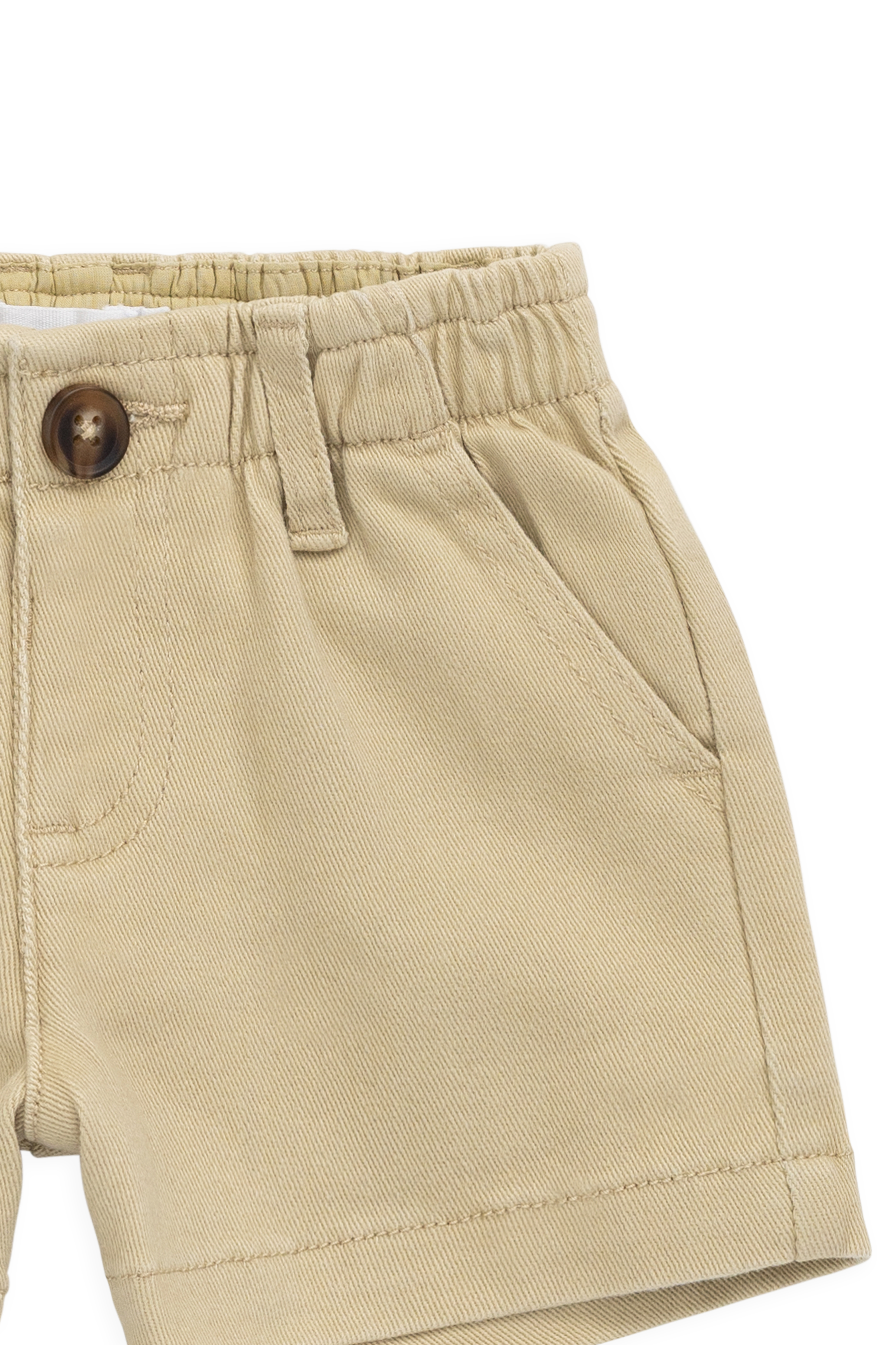 Short classique en coton élasthanne texturé neutre coloris orge, avec passants de ceinture et taille élastiquée au dos, pour les journées actives des enfants
