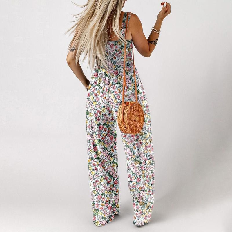 DE RDUCTION Combinaison sans manches pour femme, motif floral, poitrine smockée et jambes larges, chic et estivale.