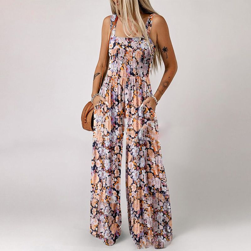 DE RDUCTION Combinaison sans manches pour femme, motif floral, poitrine smockée et jambes larges, chic et estivale.