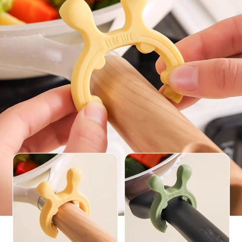 Support multi-fonctions en silicone pour poignées de casseroles et spatules
