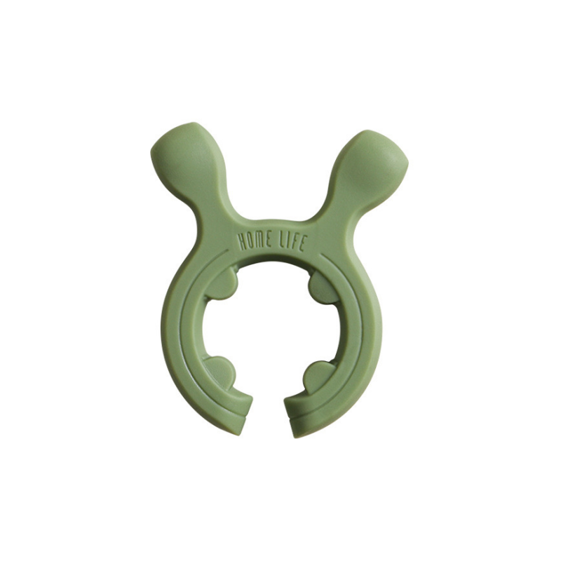 Support multi-fonctions en silicone pour poignées de casseroles et spatules