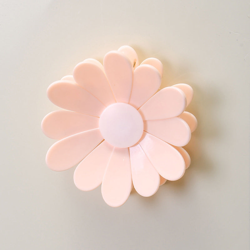 Pack of daisy-shaped magnetic closure clips