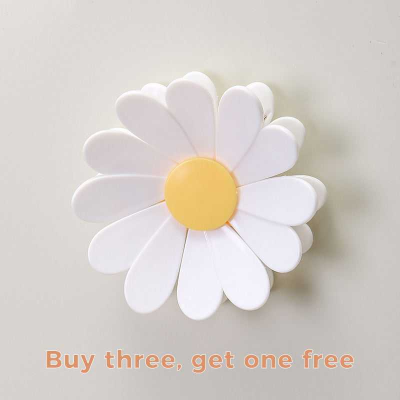 Pack of daisy-shaped magnetic closure clips