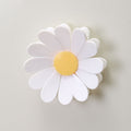 Pack of daisy-shaped magnetic closure clips