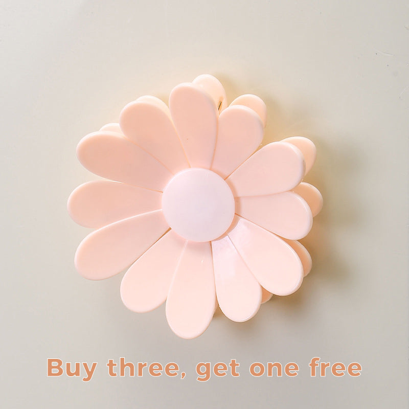 Pack of daisy-shaped magnetic closure clips