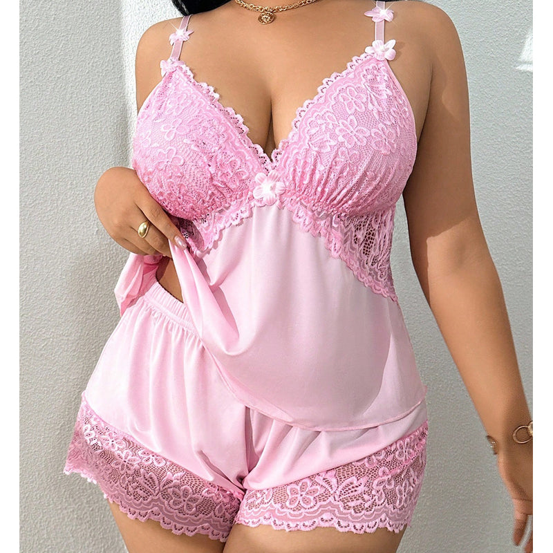 Ensemble pyjama pour femme composé d'un caraco et d'un short bordés de dentelle