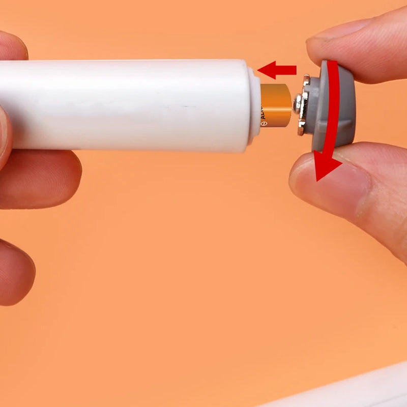 DE RÉDUCTION Stylo-gomme à piles avec deux tailles