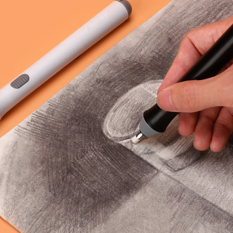 DE RÉDUCTION Stylo-gomme à piles avec deux tailles