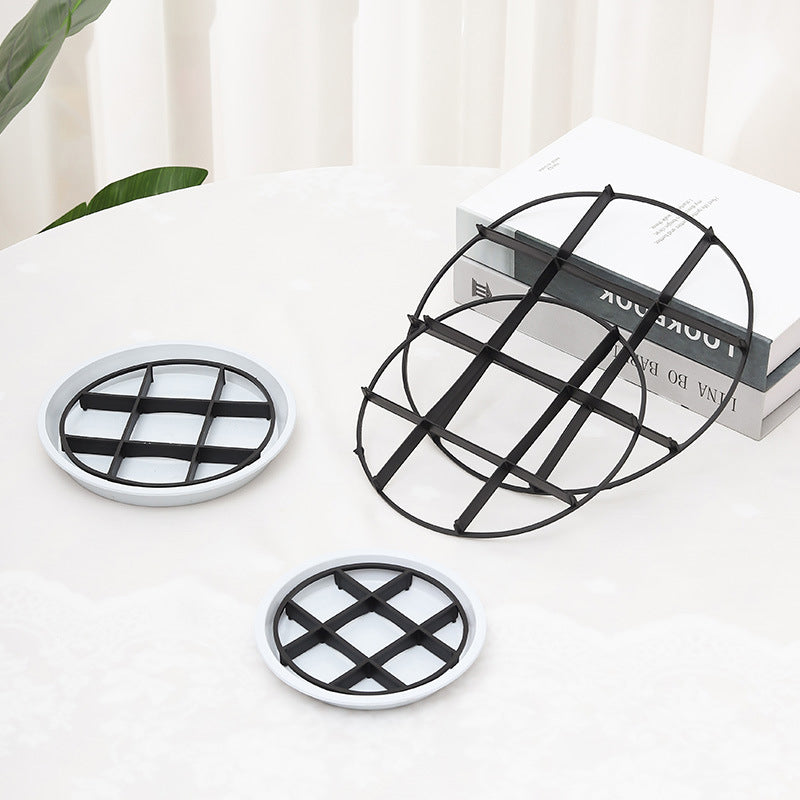 Surhlve-Pot Protecteur de Racines soulève les plantes, favorise la circulation de l'air, garde les sols propres pour usage intérieur et extérieur.