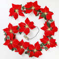 Guirlande de Noël florale Poinsettias lumineux, ambiance chaleureuse, habillez votre intérieur de tradition et de douceur, pour des fêtes inoubliables en famille